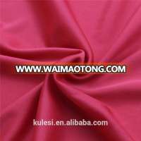 Hot sale 75D/36F 28needle 120gsm 100% polyester weft double knitting garment lining fabric plain dyed cheap for PU composite